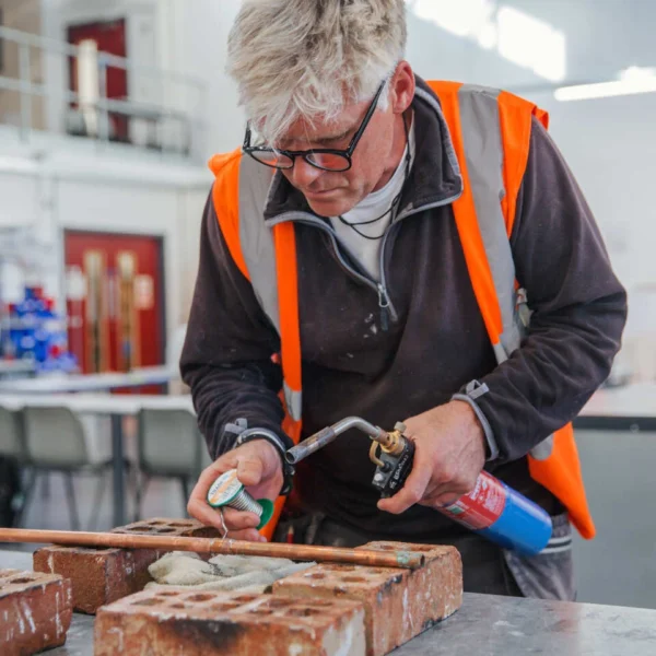 Man working with wood in a workshop