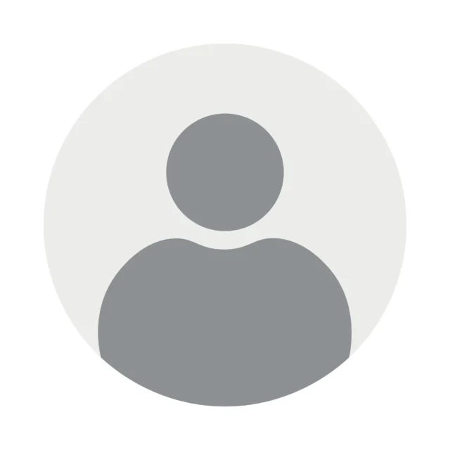 A grey silhouette of a person inside a grey circle.