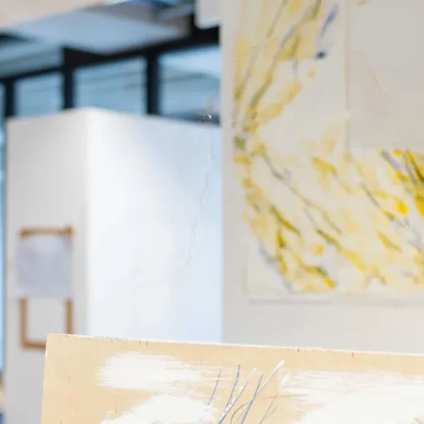 Art studio with paintings on the wall