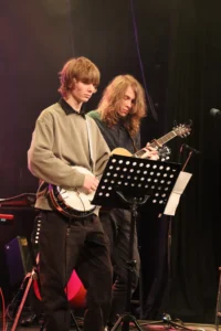 Two musicians performing on stage